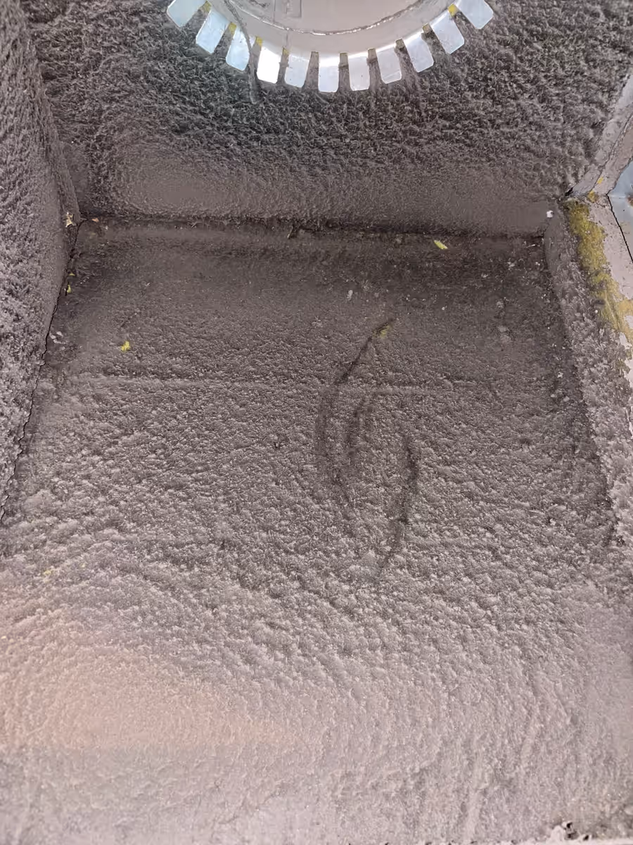 A dust-loaded return plenum opened up on a South Florida air duct cleaning job